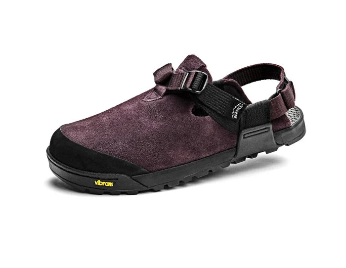 Purple sandal with black sole on a white background