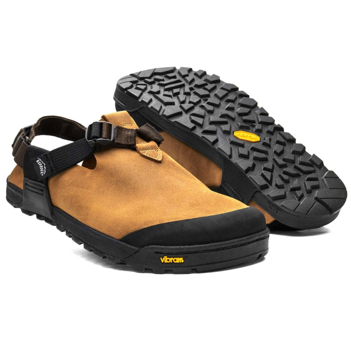 A pair of Bedrock Mountain Clogs with a premium one-piece Nubuck leather upper in brown color, an adjustable strap system, and a black Vibram Megagrip outsole.