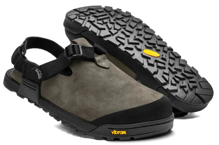 Pair of gray sandals with black soles on a white background