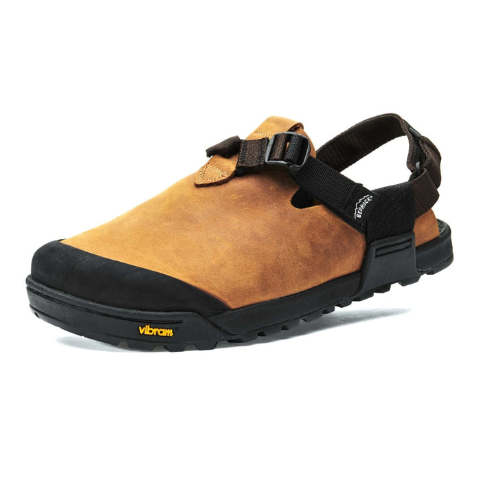 A pair of Bedrock Mountain Clogs with a premium one-piece Nubuck leather upper in brown color, an adjustable strap system, and a black Vibram Megagrip outsole.