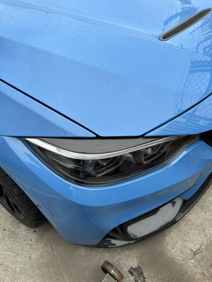 Carbon Fiber Eyelid Headlight Trim - BMW F80 M3 & F82 / F83 M4