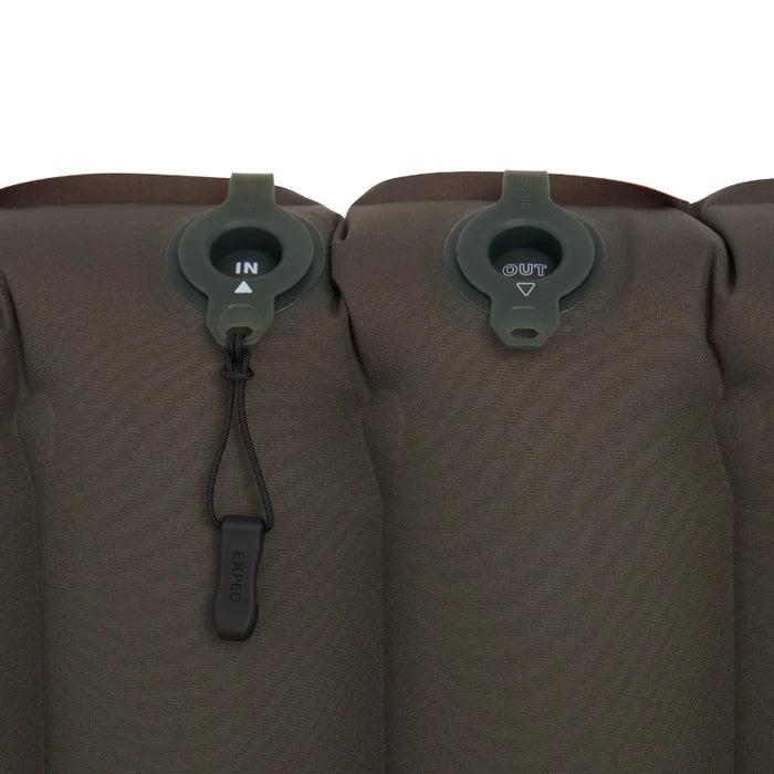 Close-up of a brown inflatable mattress with air valve controls on a white background