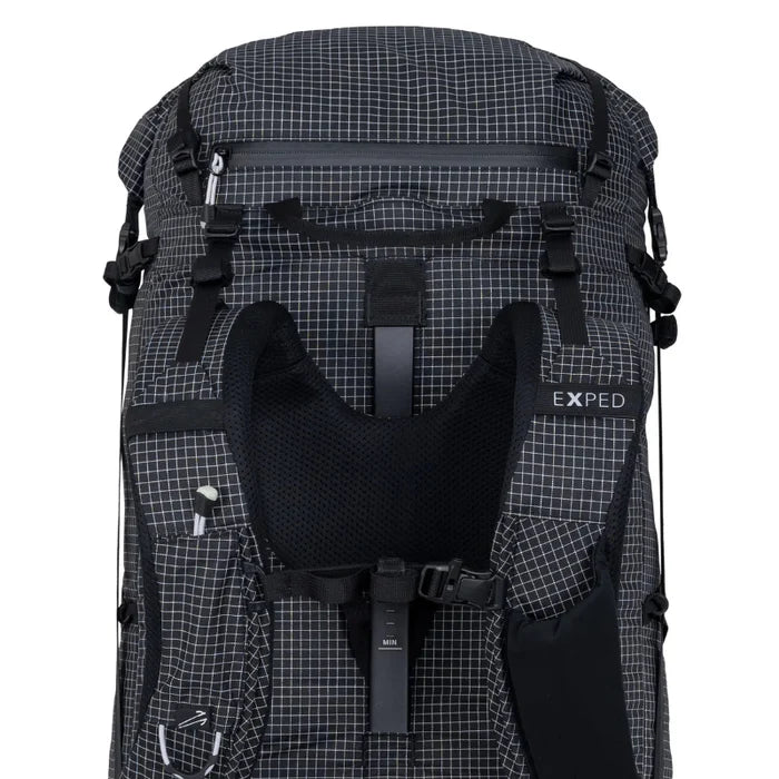 Backpack with grid pattern and 'Exped' branding on a white background