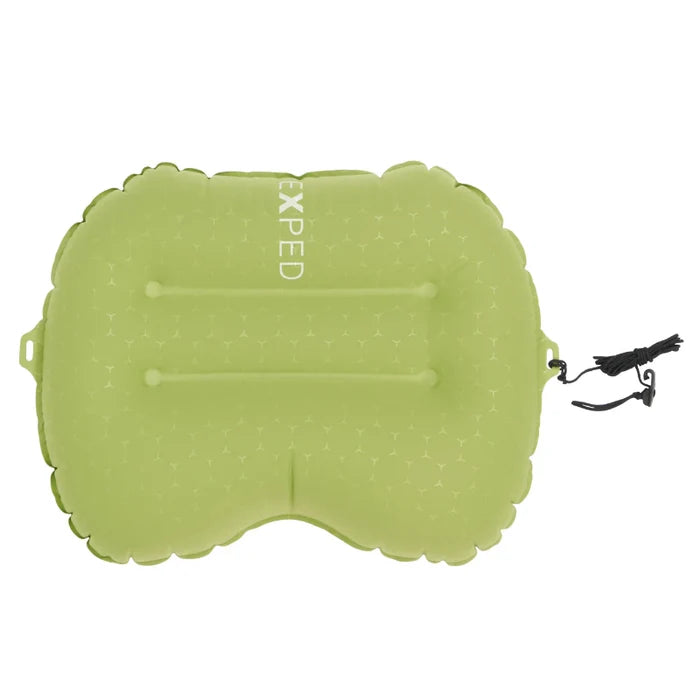 Green inflatable camping pillow with Exped branding on a white background