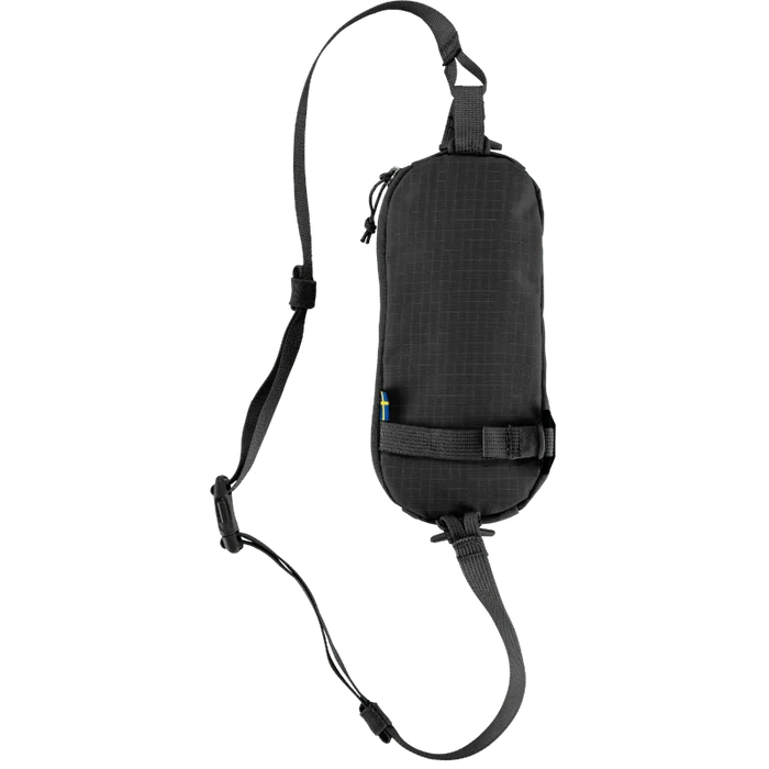 Black sling bag with a strap on a white background