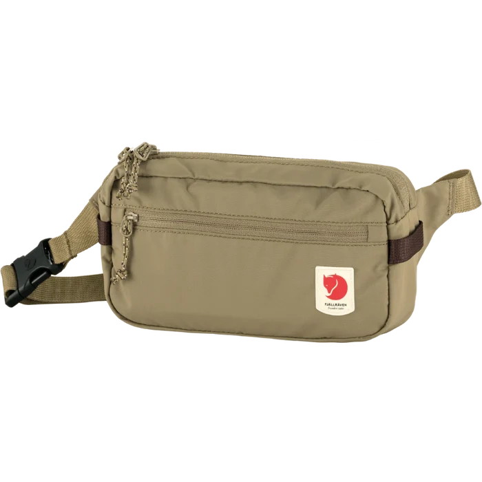 Beige Fjallraven bum bag with a visible brand logo on a white background