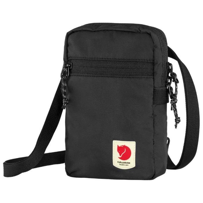 Black crossbody bag with a visible brand logo on a white background
