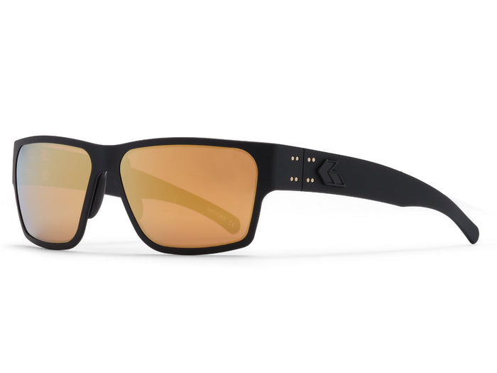 Sunglasses on their side with orange lenses