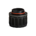 Black cylindrical container with a lid on a white background
