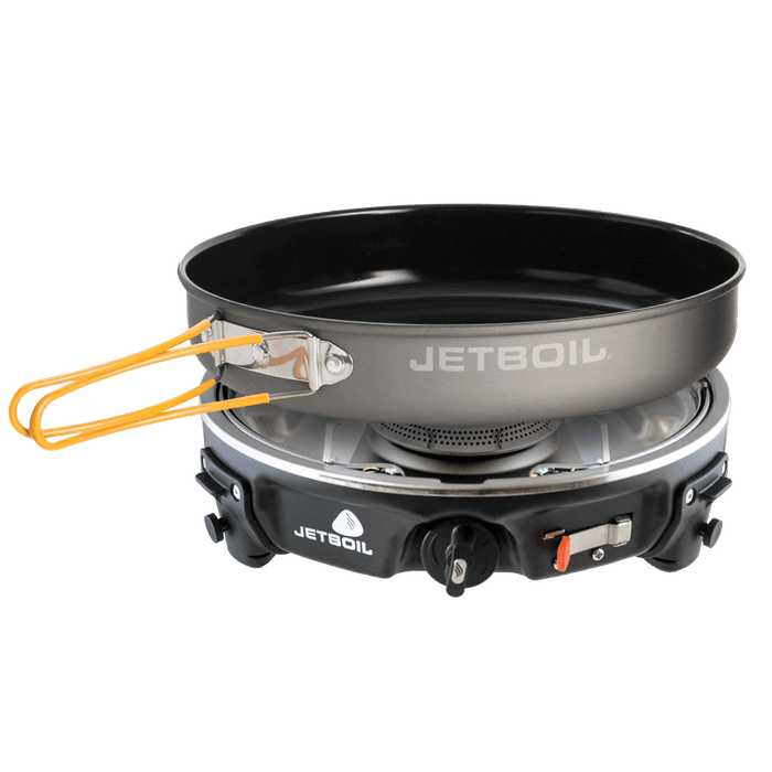 The image shows the Jetboil HalfGen Basecamp cooking system with a single burner and a 9 inch ceramic-coated fry pan, in a compact, folded position, presumably on a stove or similar cooking surface.