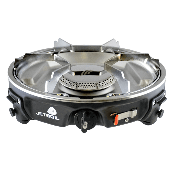 A jetboil halfgen bascamp stove on a plain background