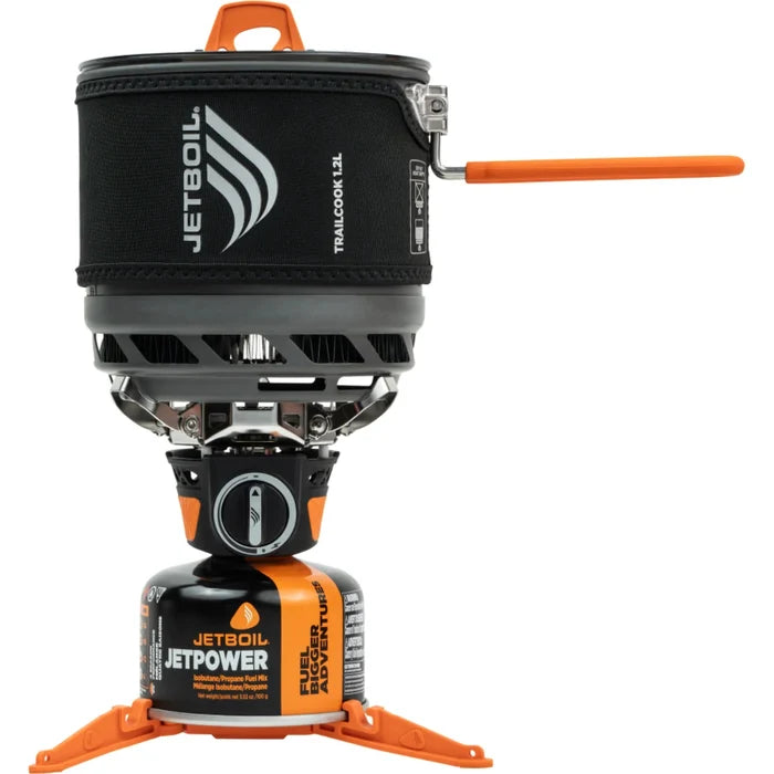 Jetboil Camping stove with black pot and orange accents on a white background