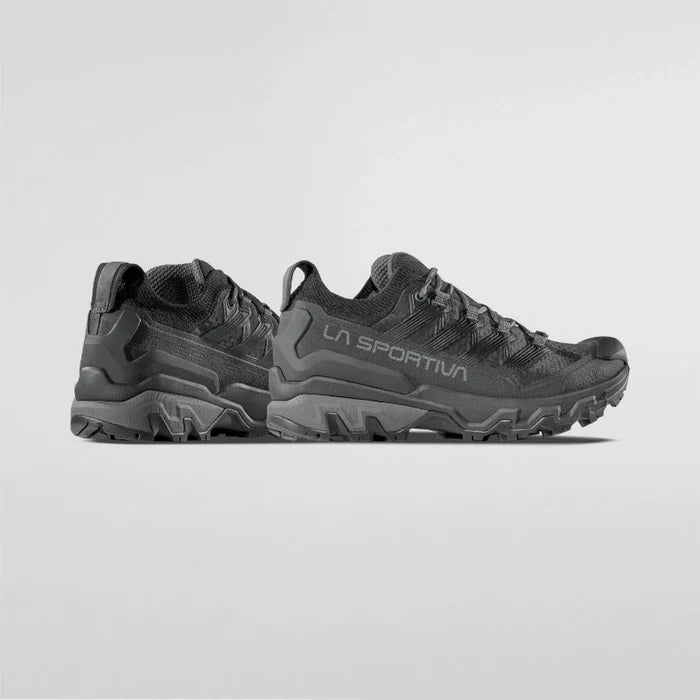 Black La Sportiva shoes on a white background