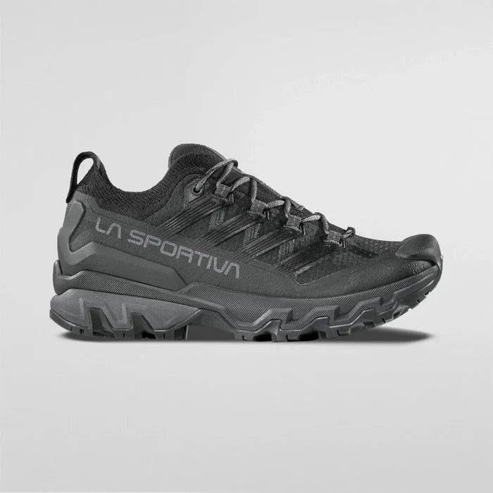 Black hiking shoes shown on the side.