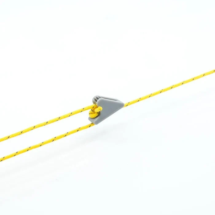 Gray clip holding a yellow rope on a white background