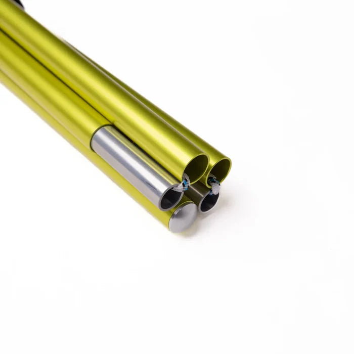 Close-up of a yellow metal pole with silver interior on a white background