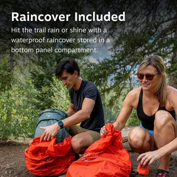 Two people setting up a tent with a raincover included, outdoors.