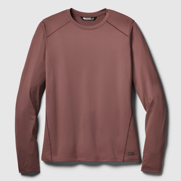 A long-sleeve athletic shirt in a dusty rose or mauve color, featuring a textured waffle knit fabric, raglan sleeves, and a small black 'OR' logo near the bottom hem, displayed on a light gray background.