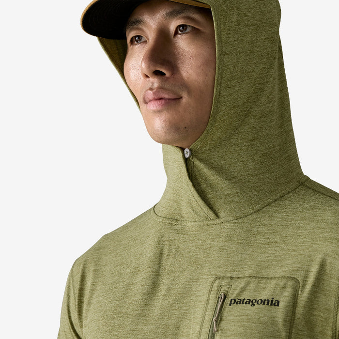 Man wearing the Patagonia Men’s Capilene Cool Sun Hoody Fitz Roy Trout showing the hood detail button