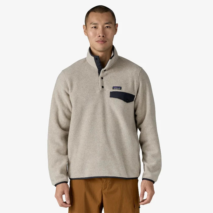 Patagonia Men's Lightweight Synchilla Snap-T Fleece Pullover worn by a man in mustard pants