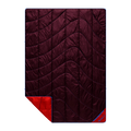 A dark burgundy quilted sleeping pad with a bright red reverse side and blue trim, shown on a plain white background.