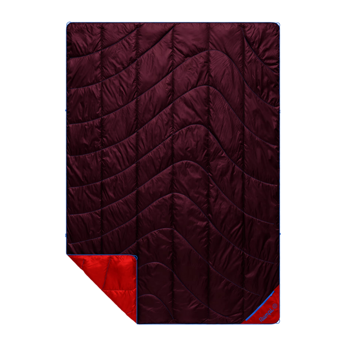 A dark burgundy quilted sleeping pad with a bright red reverse side and blue trim, shown on a plain white background.