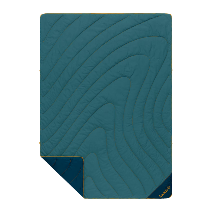 Teal quilted blanket with a brand logo on a white background