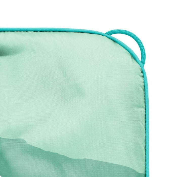 Close-up of a teal cushion with a white background