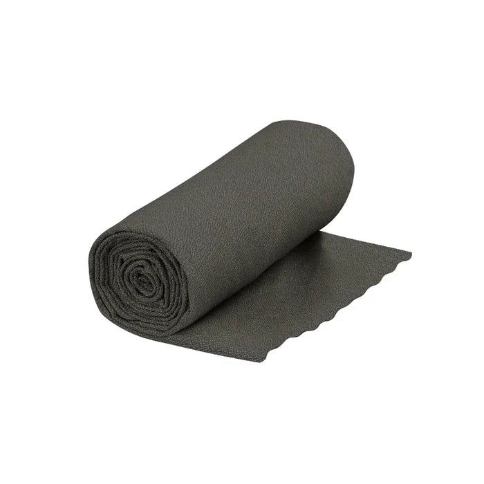 Rolled-up black mat on a white background