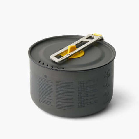 A hard-anodised aluminium alloy camping pot with a ceramic non-stick coating and a removable Click-Safe handle, alongside a yellow lid with strainer holes and a LidKeep feature.