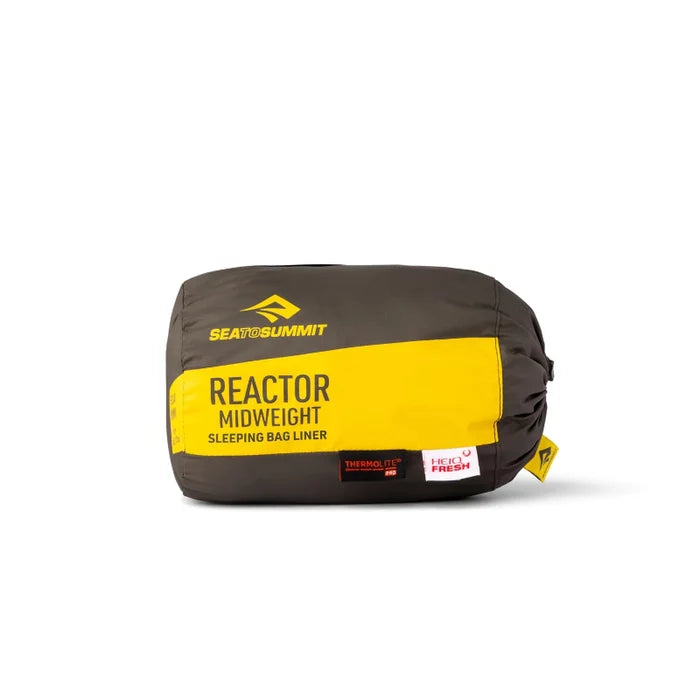 Sleeping bag liner with yellow and black design on a white background