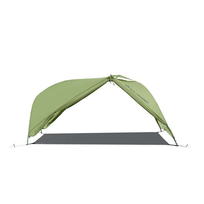 A green Sea To Summit Telos LightFoot Footprint laid out on a flat surface, designed for use under a tent to protect the floor.