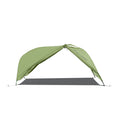 A green Sea To Summit Telos LightFoot Footprint laid out on a flat surface, designed for use under a tent to protect the floor.
