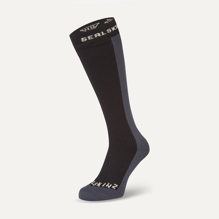 Black and gray compression sock with 'Sealskinz' branding on a white background