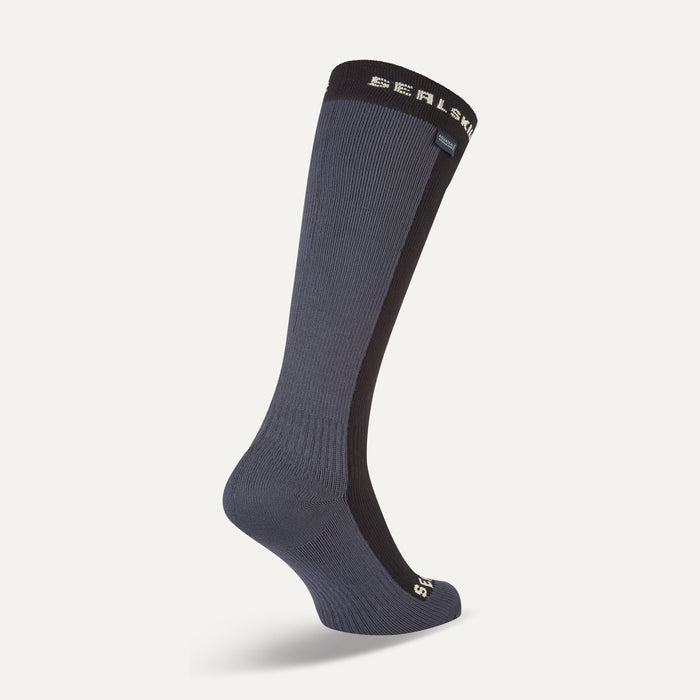 Gray knee-high sock with brand logo on a light gray background