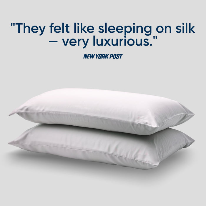 Two moonstone grey pillowcase with a quote from The New York Post