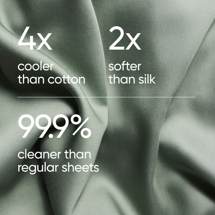 Silky fabric with text highlighting its properties compared to cotton and silk.