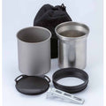 A 2-piece stainless steel camping cooking set with a matte gray sleeve, including a lid, ring, clip, and black mesh storage bag, displayed on a light gray background.