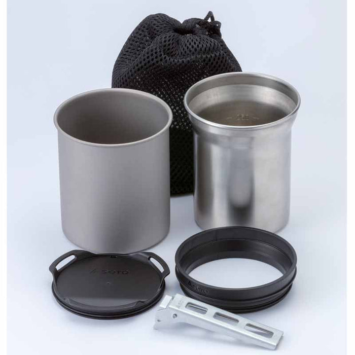 A 2-piece stainless steel camping cooking set with a matte gray sleeve, including a lid, ring, clip, and black mesh storage bag, displayed on a light gray background.