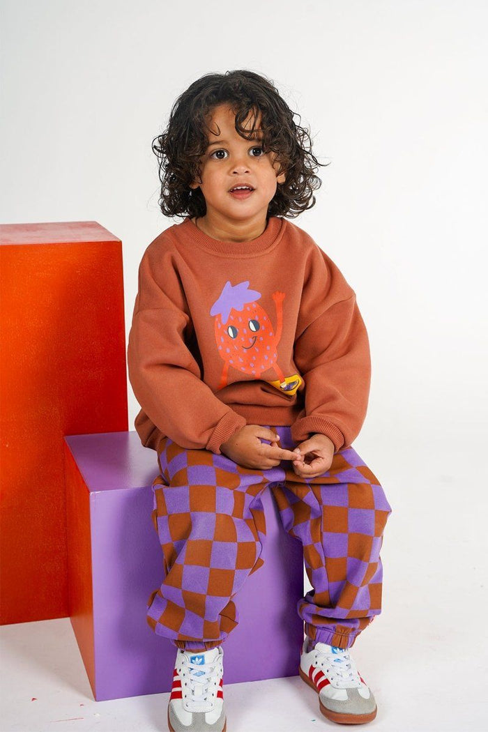 The New Chapter | Wolf sweatpants | Checker
